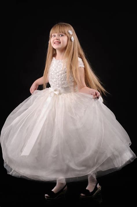 Little Smilling Girl in a Long Dress Stock Photo - Image of dress, cute ...