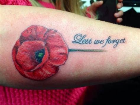 Lest we forget quote tattoo with poppy flower on arm idea | Infinity ...