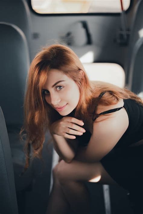 Woman in Black Top While Looking Up · Free Stock Photo