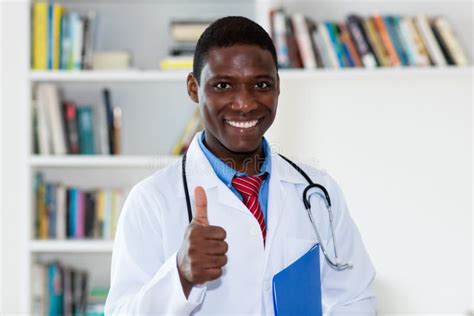 Friendly African American Male Doctor Stock Photo - Image of healthcare, clinic: 148033270