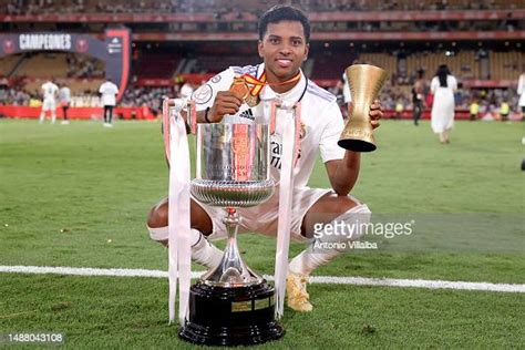 Rodrygo Goes of Real Madrid with the Copa del Rey and MVP trophies at ...