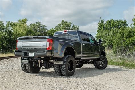 big lifted dually ford super duty diesel truck with fuel triton wheels and toyo r/t tires and ...