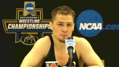 Iowa's Spencer Lee reacts after winning his second straight national title.