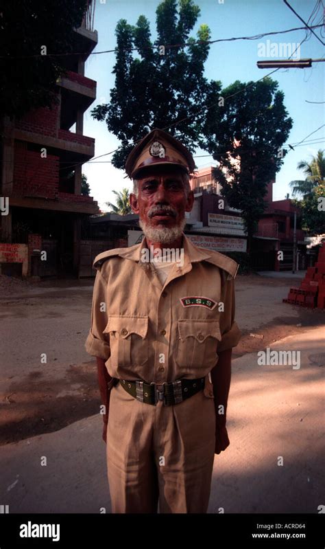 Bangladesh security guard standing proud in his uniform Stock Photo - Alamy