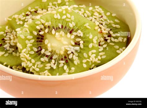 Kiwi with Sesame Seeds Stock Photo - Alamy