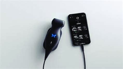 Butterfly iQ+ ultrasound probe connected to a smart device. | Download Scientific Diagram