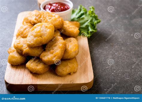 Chicken nuggets with sauce stock photo. Image of nuggets - 134687778