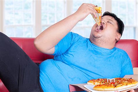 Royalty Free Fat Guy Eating Pizza Pictures, Images and Stock Photos ...