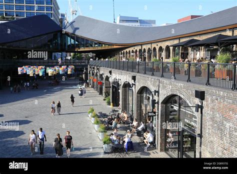 Shops and restaurants at Coal Drops Yard, Kings Cross, London, UK Stock Photo - Alamy