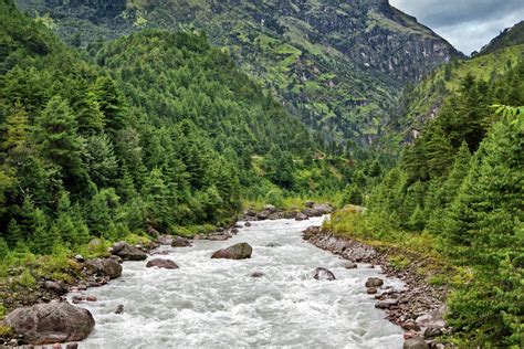 River flowing from himalaya highlands, Nepal - Stock Photo - Dissolve