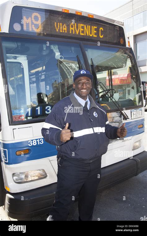 Portrait of a New York City MTA bus driver in front of his bus Stock ...