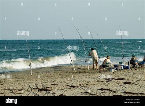 people fishing on the beach near sebastian inlet state park in florida Stock Photo - Alamy