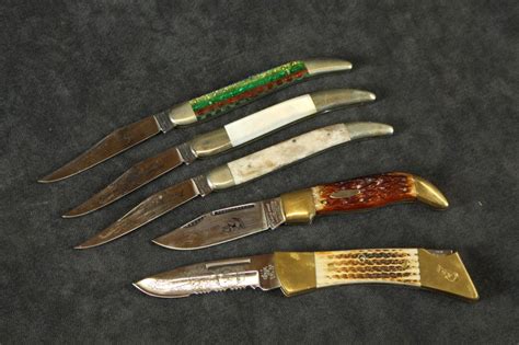 Lot - COLLECTION OF FIVE FOLDING KNIVES