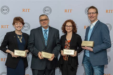 Four RIT faculty and staff alumni acknowledged with the Golden Brick Award | RIT