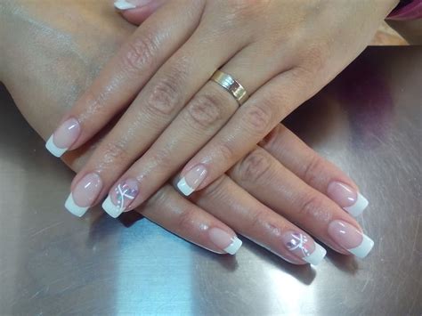 woman, wearing, gold-colored ring, white, french-tip, manicures, nail ...