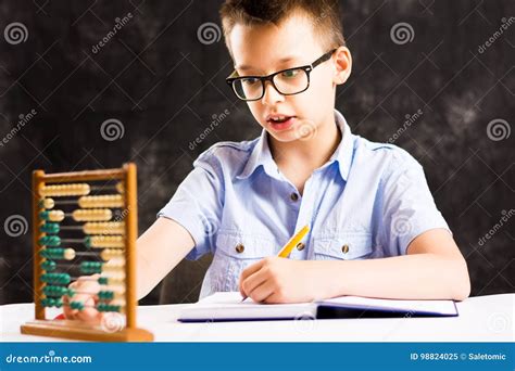 Boy Doing Math Homework at Home Stock Image - Image of happy, home: 98824025