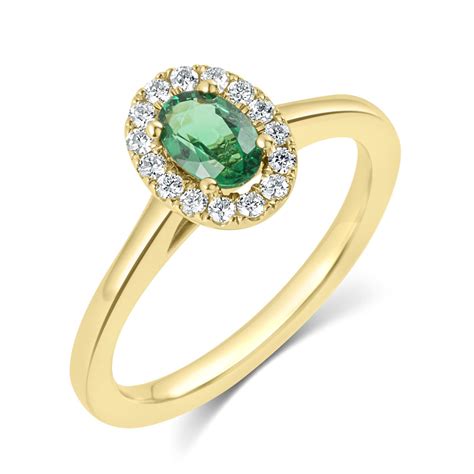 Oval Emerald and Diamond Halo Ring | Pravins