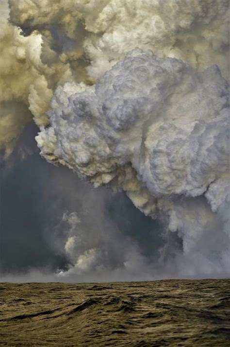 Pyrocumulus Cloud Over a Golden Sea Photograph by Heidi Fickinger - Fine Art America