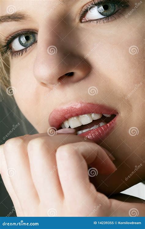 Model Biting Her Fingernail Royalty Free Stock Photo - Image: 14239355