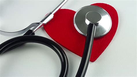 Stethoscope and Heart on White Background Stock Video Footage - Storyblocks