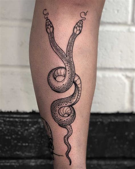 Two-headed snake tattoo by Lozzy Bones - Tattoogrid.net