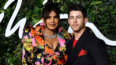 Nick Jonas poses with banner reading 'Jewel of July' at Priyanka Chopra ...