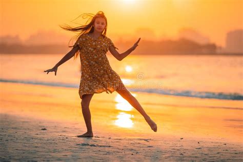 Adorable Happy Little Girl on White Beach at Sunset. Stock Photo - Image of lifestyle, people ...