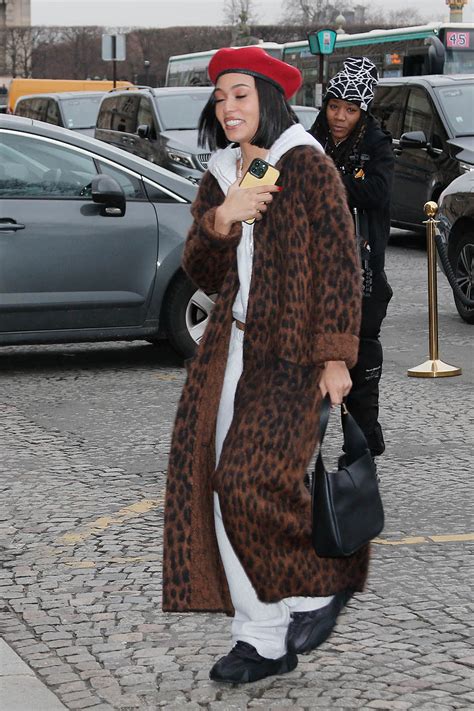 Coi Leray Elevates Sweatsuit With Leopard Coat & Sneakers at PFW ...