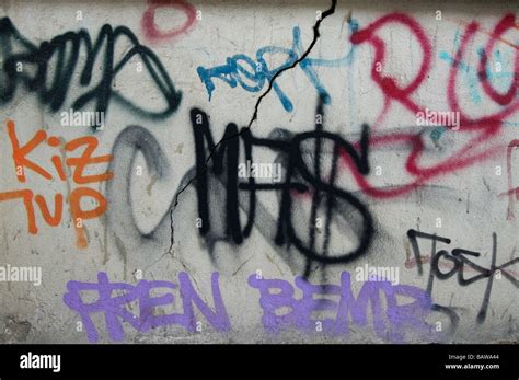 Graffiti on a broken wall Stock Photo - Alamy