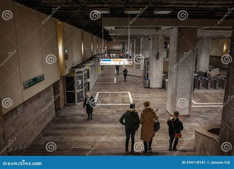 BUCHAREST, ROMANIA - MARCH 13, 2023: Selective Blur on People Going Down the Stairs of Metro ...