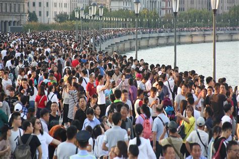 China’s Population Grows Marginally to 1.412 Billion, May Begin Decline ...