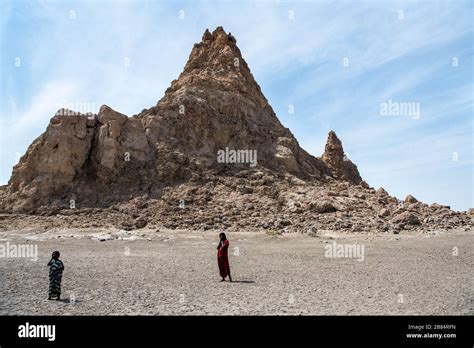 Africa, Djibouti, Lake Abbe. Landscape view of lake Abbe Two children ...