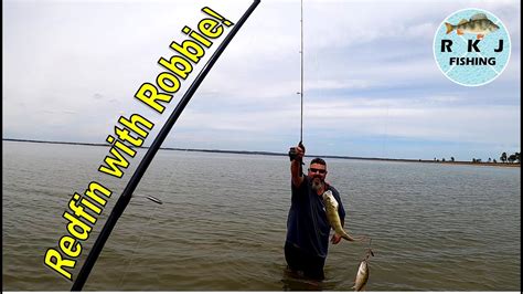 Catching redfin with Robbiefishing before we even launched our kayaks - YouTube