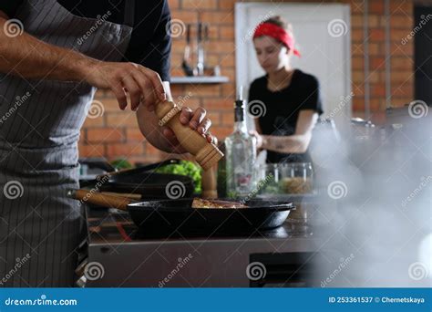 Professional Chef Cooking Meat on Stove in Restaurant Kitchen Stock ...