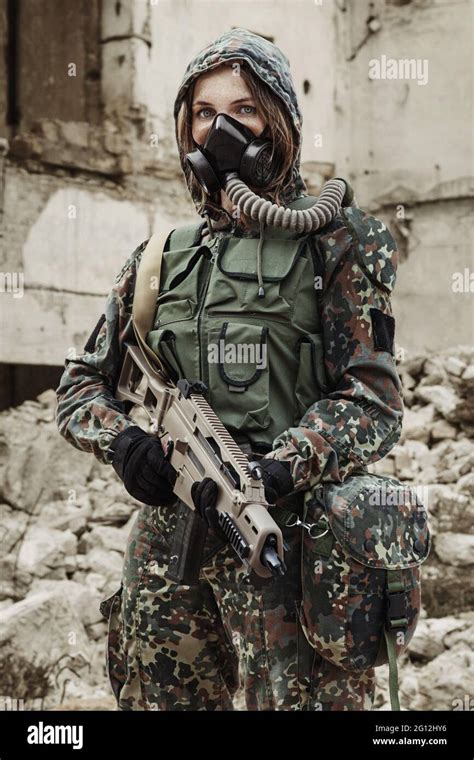 Post apocalypse. Female survivor in gas mask Stock Photo - Alamy