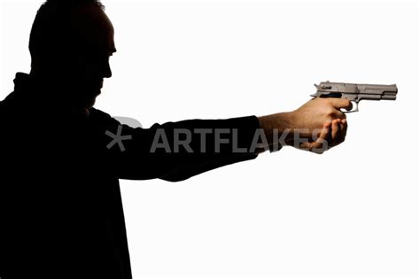 "Silhouette of man holding gun" Photography art prints and posters by Sami Sarkis Photography ...