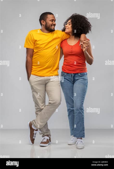 happy african american couple hugging Stock Photo - Alamy