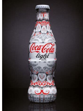 LSN : News : Soda style: Designers dress cola bottles for charity