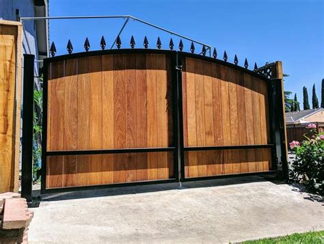 Wooden Driveway Gate Kit | Arched, Wrought Iron, Ironwood, Finials | StandardGates Custom Metal ...