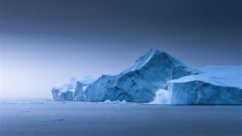 The odds of witnessing a calving iceberg in the blue hour, and being able to photograph it - are ...