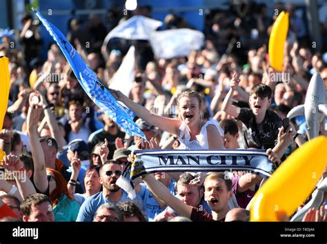 Manchester City fans celebrate as Manchester City win the premier league, at the Etihad Stadium ...