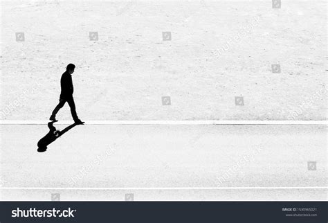 Lonely Man Shadow Walking On White Stock Photo 1530965021 | Shutterstock