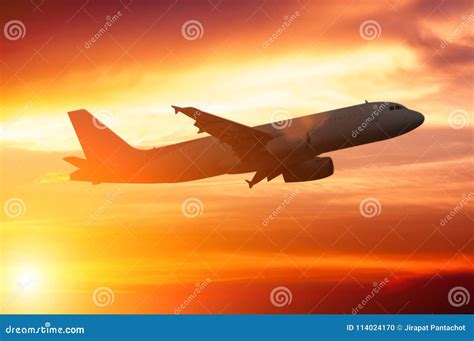 Silhouette of a Plane Flying in Beautiful Sunset Editorial Image - Image of summer, evening ...