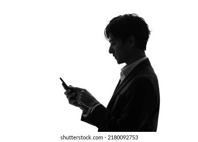 Silhouette Young Businessperson Using Smart Phone Stock Photo ...