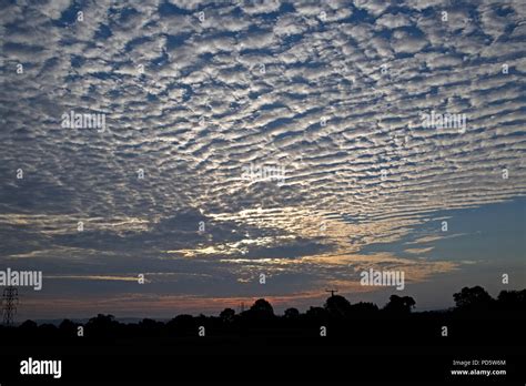 Cirrocumulus and altocumulus clouds patterns producing mackerel sky at ...