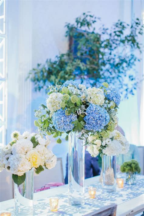 Tall Blue and White Hydrangea Centerpieces | Blue wedding flowers, Hydrangeas wedding, Hydrangea ...