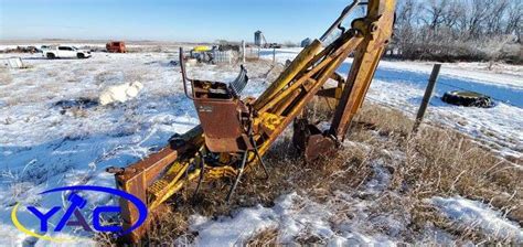 Backhoe Attachment - YAC Auctions