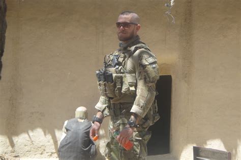 SAS veteran Oliver Schulz charged with war crime of murder over killing of Afghan man in field ...