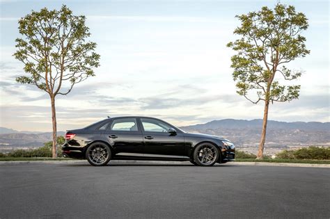 Vorsteiner Redesigns Elegant Black Audi A4 — CARiD.com Gallery