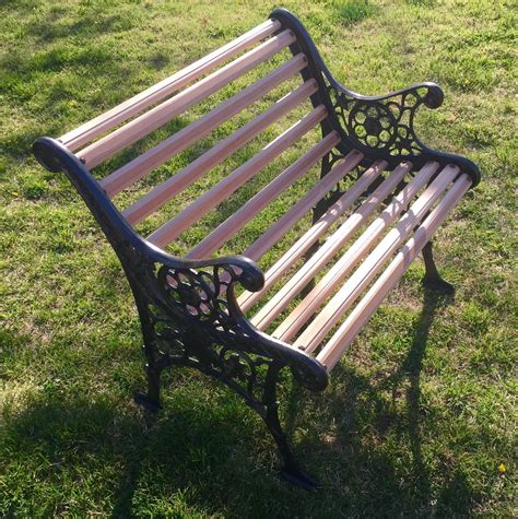 Vintage cast iron garden bench with cedar by PasTreasuresonEtsy